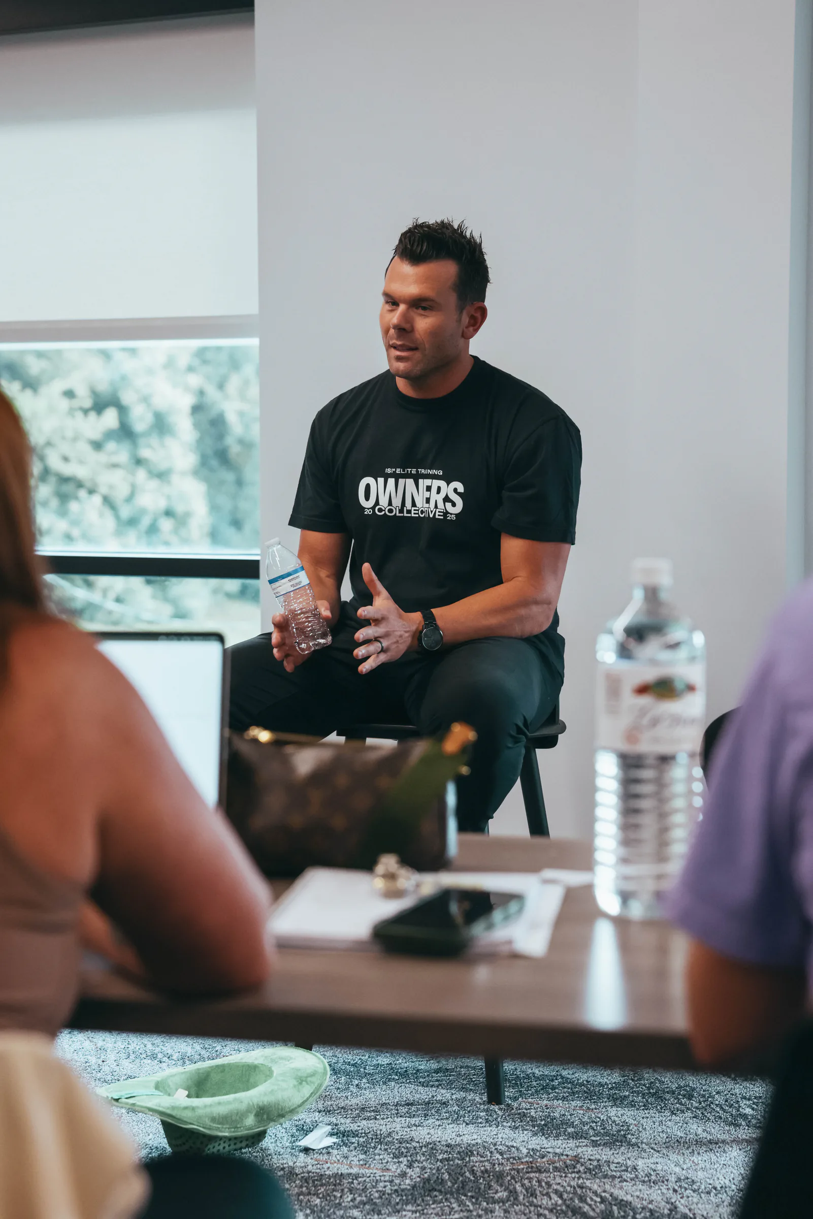 Panelist speaking during an Owners Collective discussion